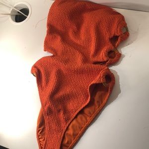 Burnt orange one piece with side cut outs